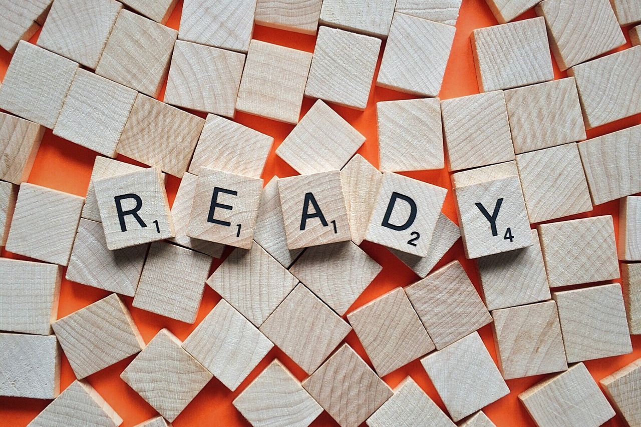 scrabble tiles laid out to spell "ready"